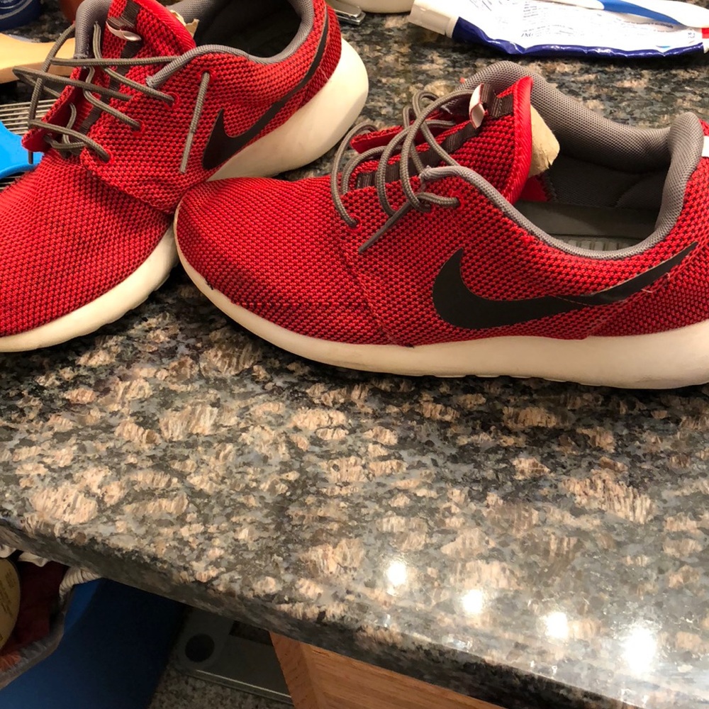 Red Nike Roshe Run shoe size 10